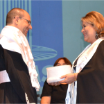 Imagem com o professor Marcelo Turine sendo Empossado Reitor da UFMS pela professora Célia Maria